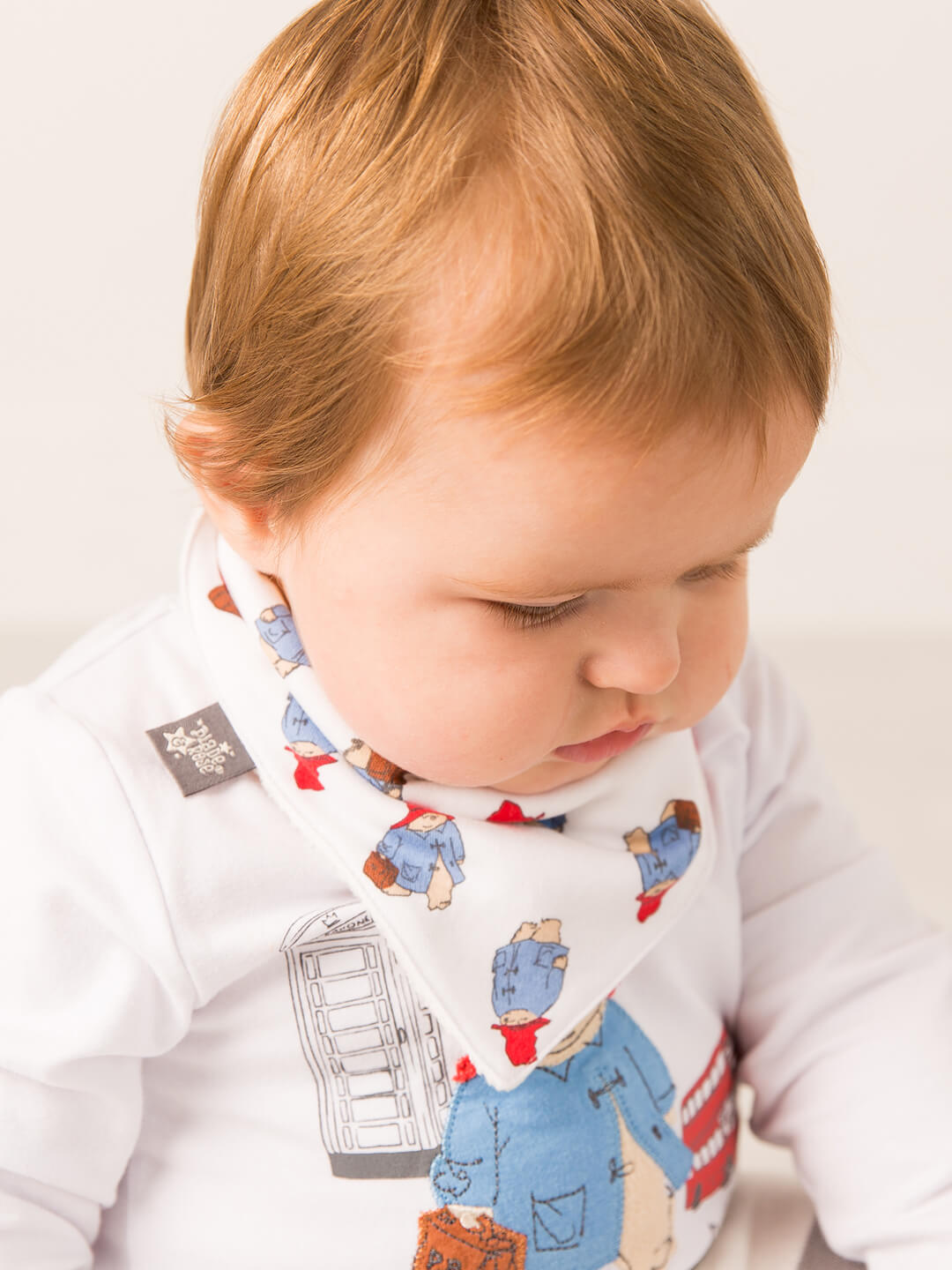 Paddington™ Loves to Travel Bib