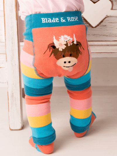 Colorful striped leggings with a cow design and 'Blade & Rose' branding.