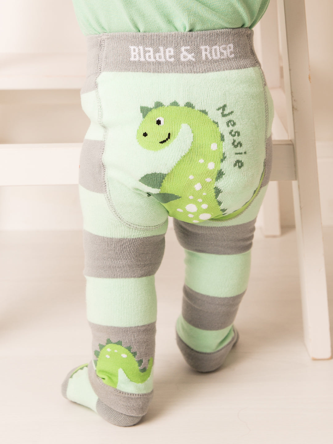 Children's leggings with dinosaur design and 'Blade & Rose' branding on a light background