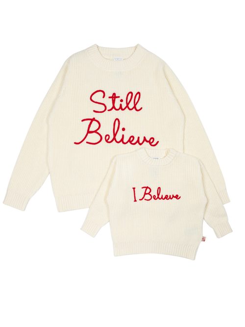 Still Believe adult jumper and I Believe kids jumper in cream with red embroidery, laid flat