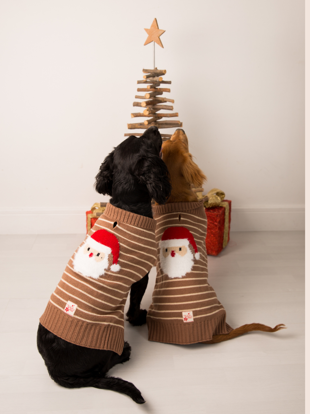 Santa Ho Ho Ho knitted dog jumper showing the fluffy Santa motif on the back